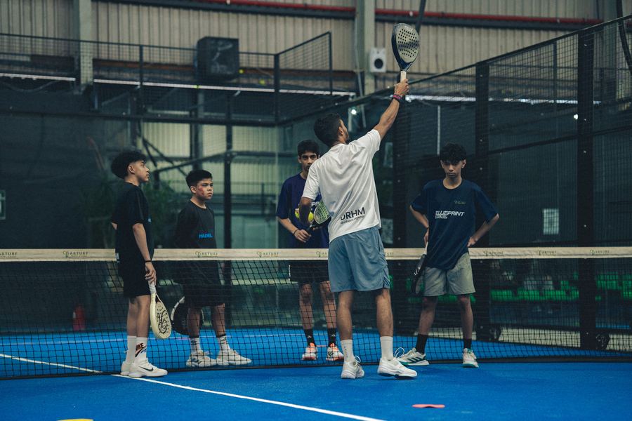 Academy training group on court